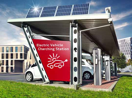 E-Cars on Electric Solar Charging Station with City Buildings