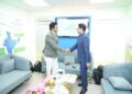Mr Vineet Mittal, Chairman, Avaada Group (R) shaking hands with Actor and Gorakhpur MP Shri Ravi Kishan (L) at REI Expo 2026